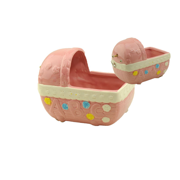 PINK BABY PLANTER W/ MUSIC EA